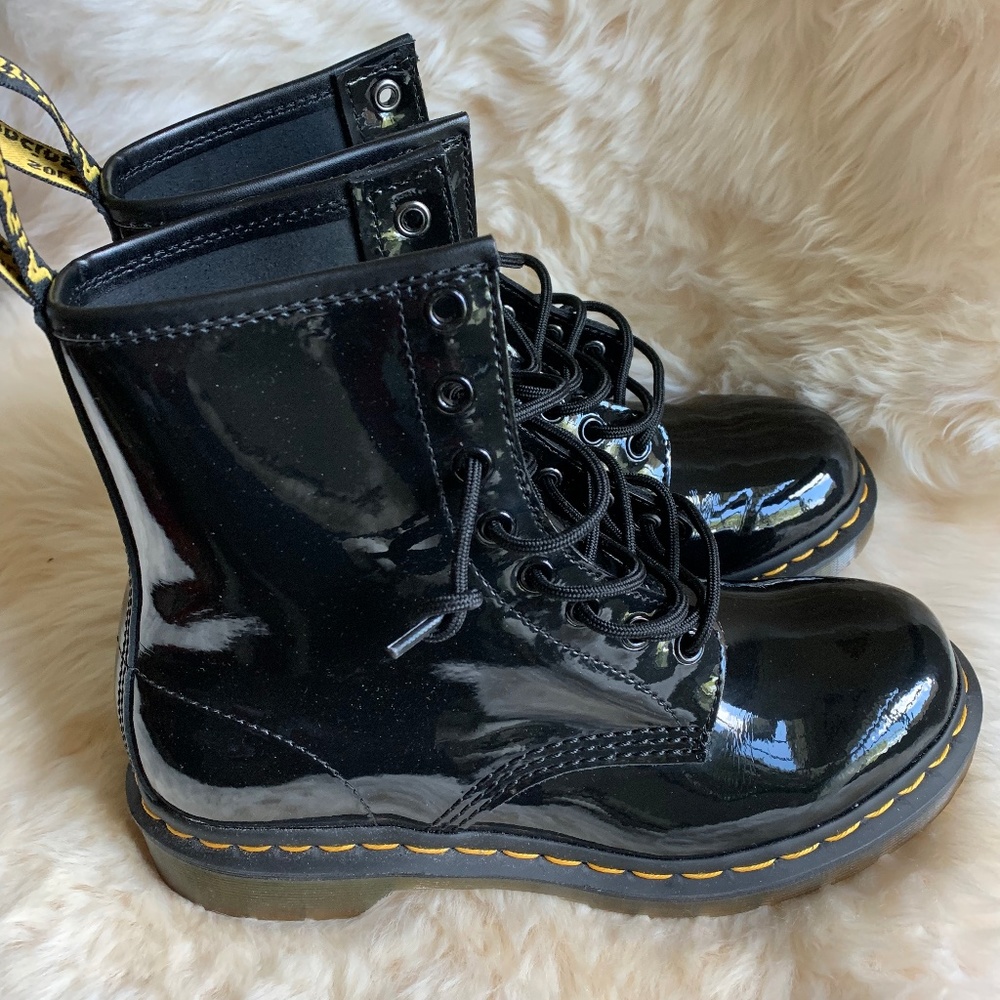 Dr. Martens patent leather lace up moto boots